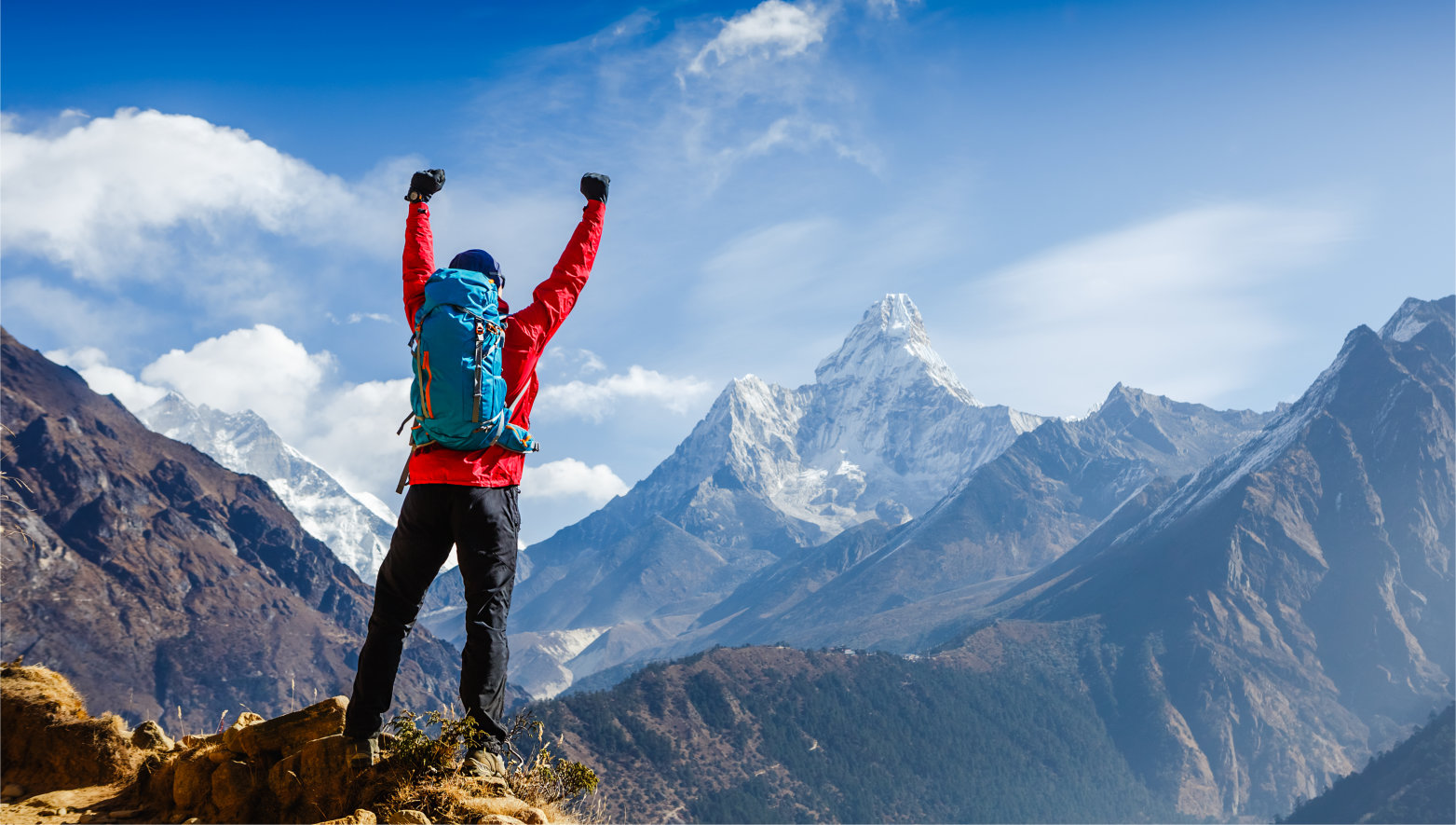 Hiker,Cheering,Elated,And,Blissful,With,Arms,Raised,In,The